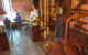 Unter Volldampf: Brennblase und Spirit Safe im Stillhouse von Bruichladdich auf Islay (Foto: Malt Whisky)